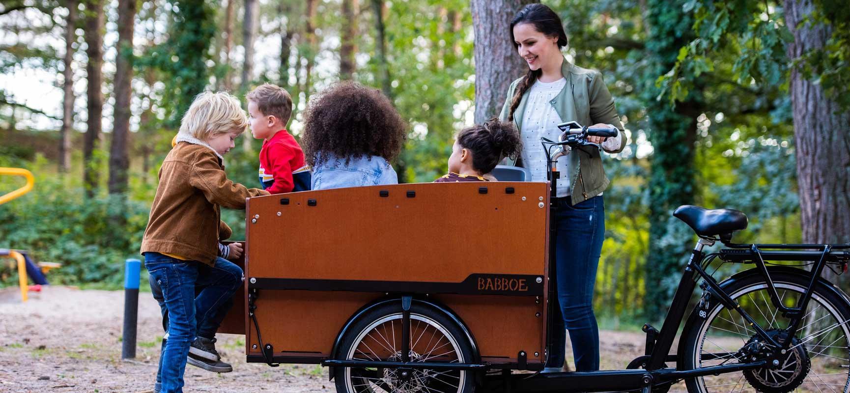 Riding to school in the Babboe Max-E